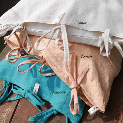 Long cushions with removable covers made of robust cotton house canvas